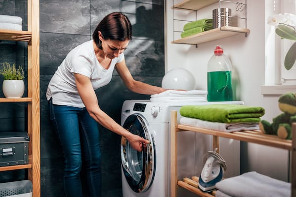 Organized and fresh laundry room with baskets and detergents
